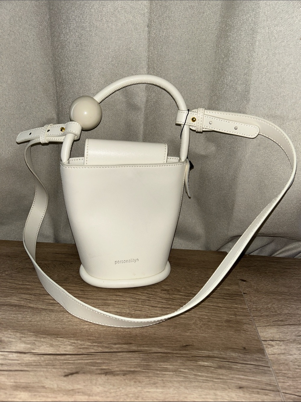 Persona Cream Structured Bucket Crossbody with Spherical Handle Accent